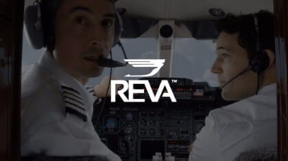 IU C&I Studios Page REVA Air Ambulance White Reva logo against background of two pilots in the cockpit
