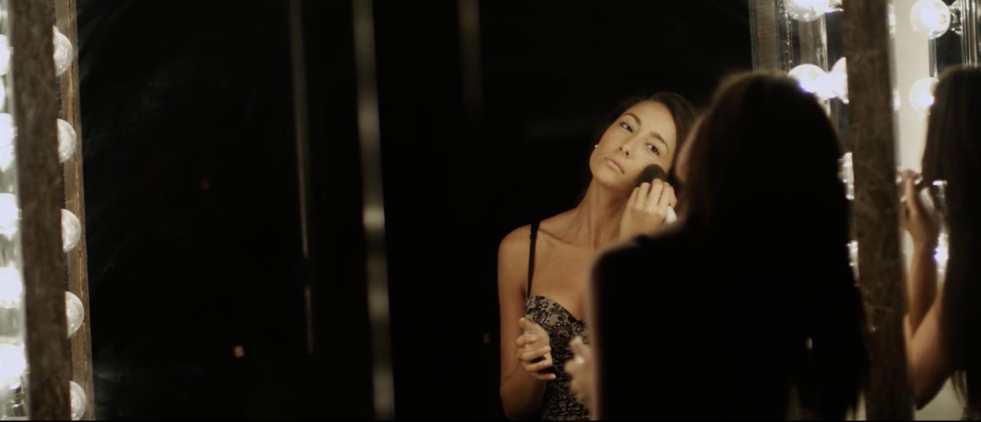 Scene shot from Classic: Yrma Perdomo applying makeup.