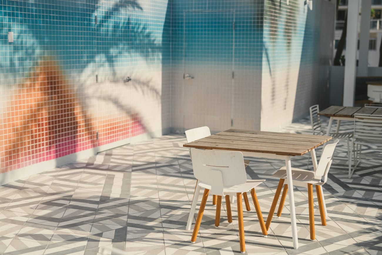 W Fort Lauderdale Residences Marketing Solutions by C&I An Idea Agency View of patio with tables and chairs