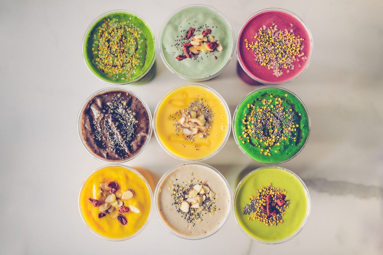 View from above of nine different smoothies on display