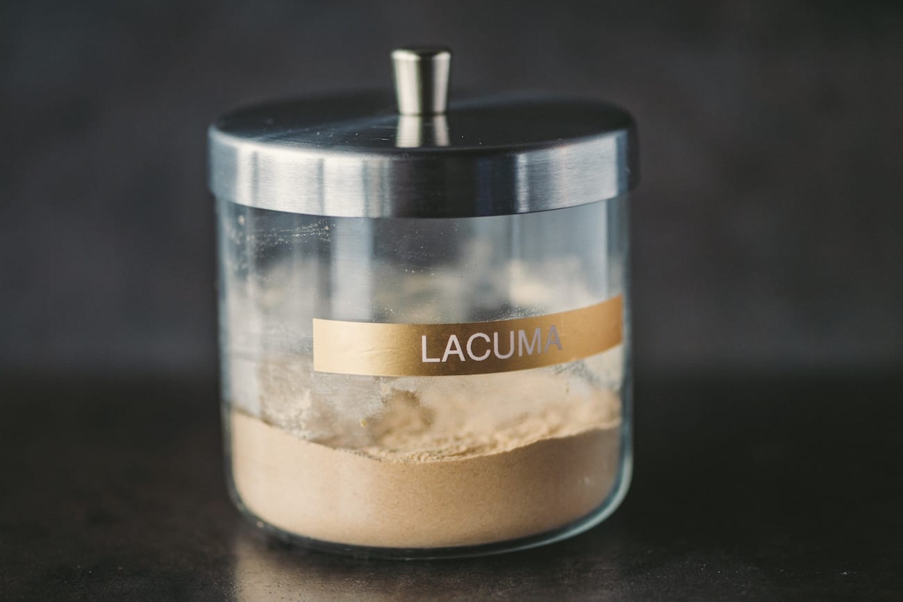 Lacuma powder in a glass container