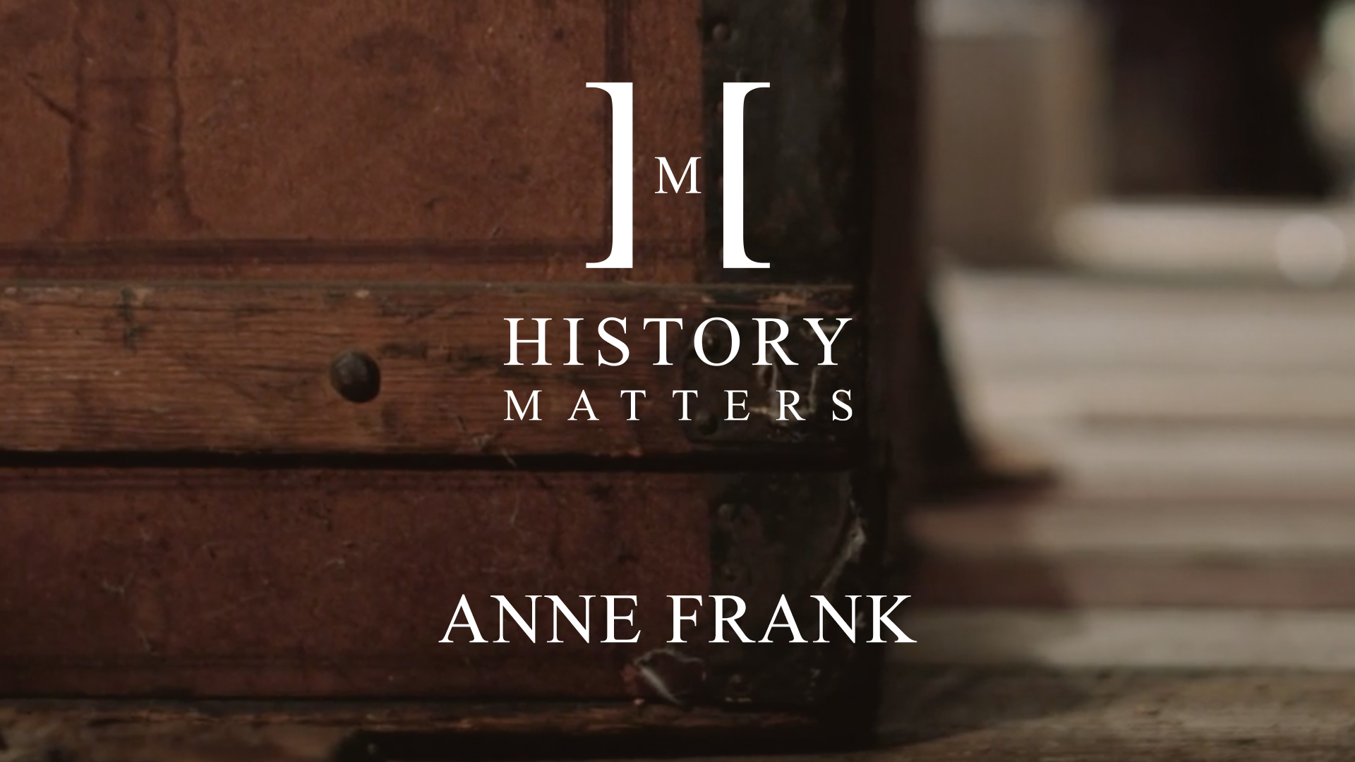 IU C&I Studios Page White History Matters Anne Frank by Beth Bryant logo with background closeup of a wooden trunk