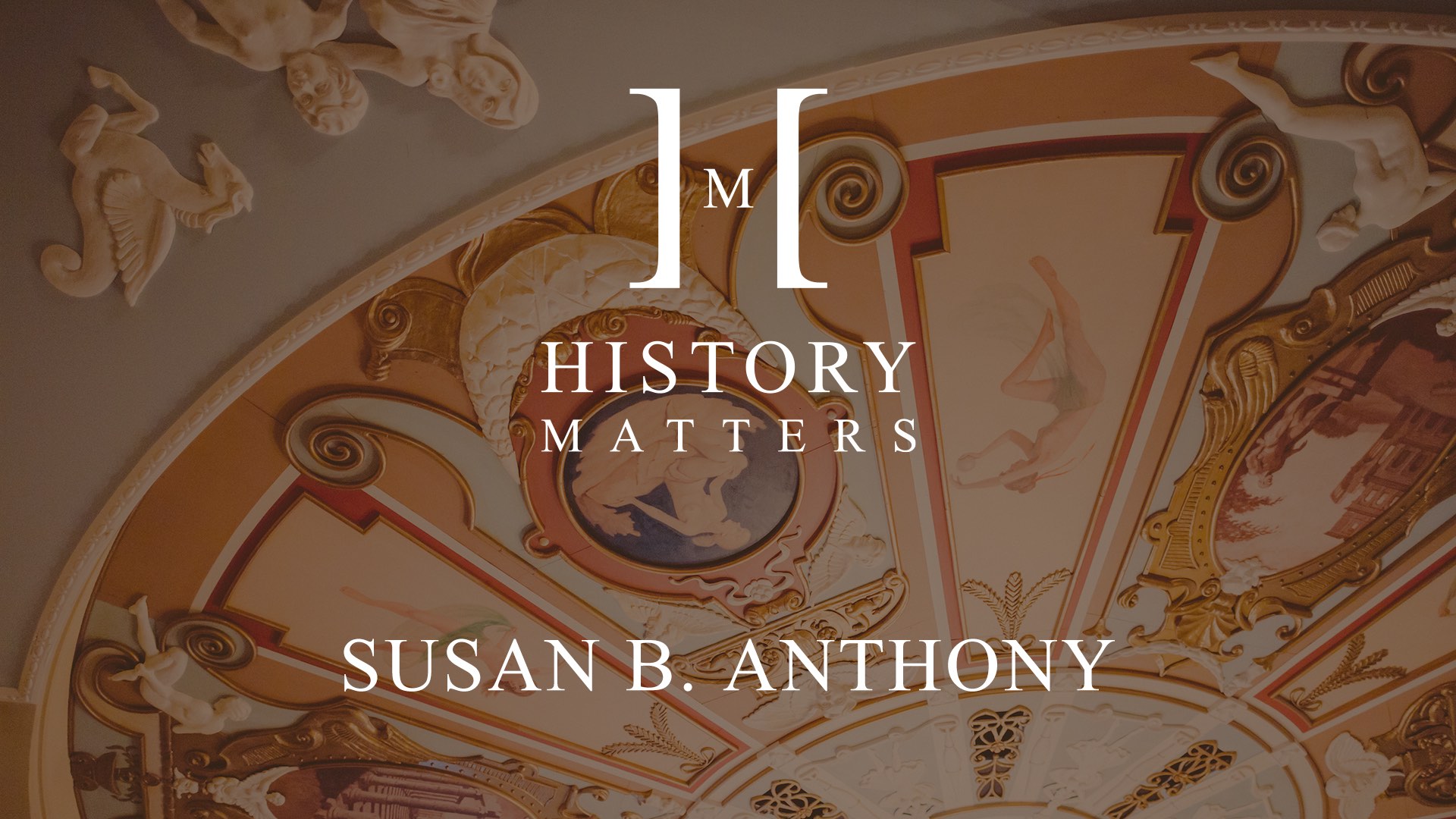 IU C&I Studios Page White HM Susan B Anthony logo with background closeup of ornate ceiling art