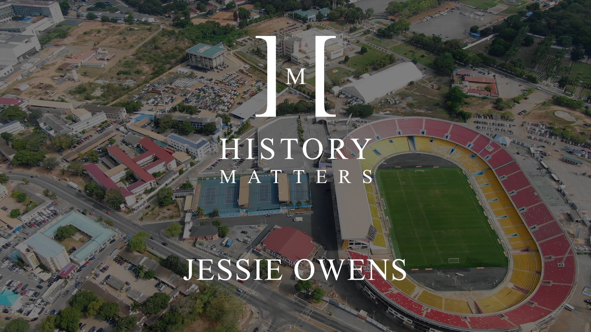 IU C&I Studios Page White History Matters Jessie Owens logo with dimmed background aerial view of buildings, tennis courts and stadium