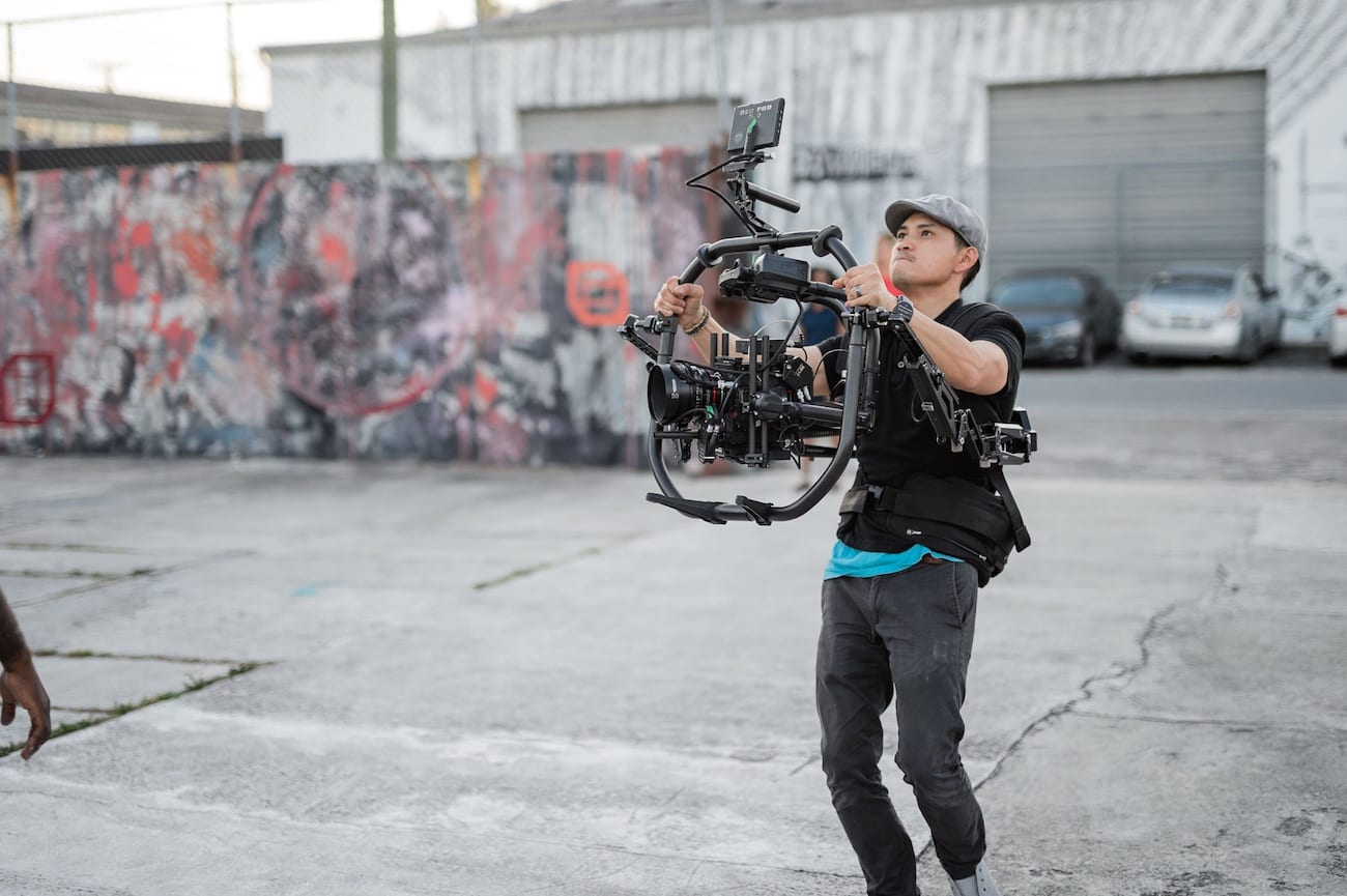 OneUnited BTS 16 Advertising Agency in Fort Lauderdale Video cameraman using video equipment