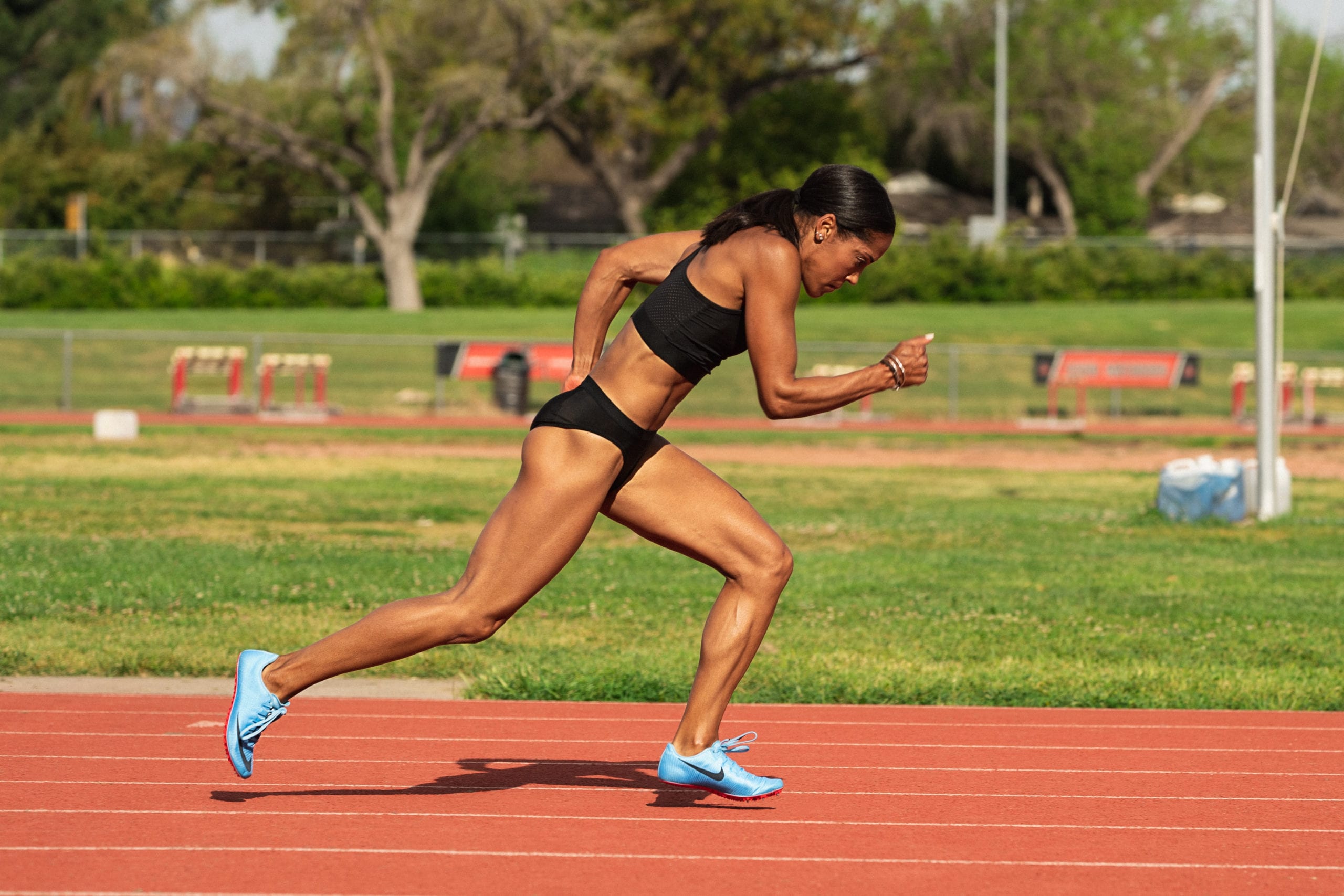 Karelle Edwards running on a track