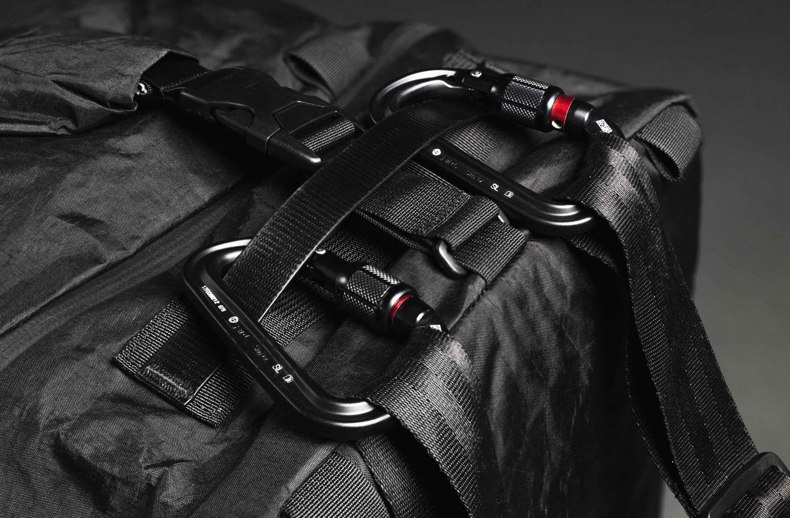 Closeup view of fasteners on black bag