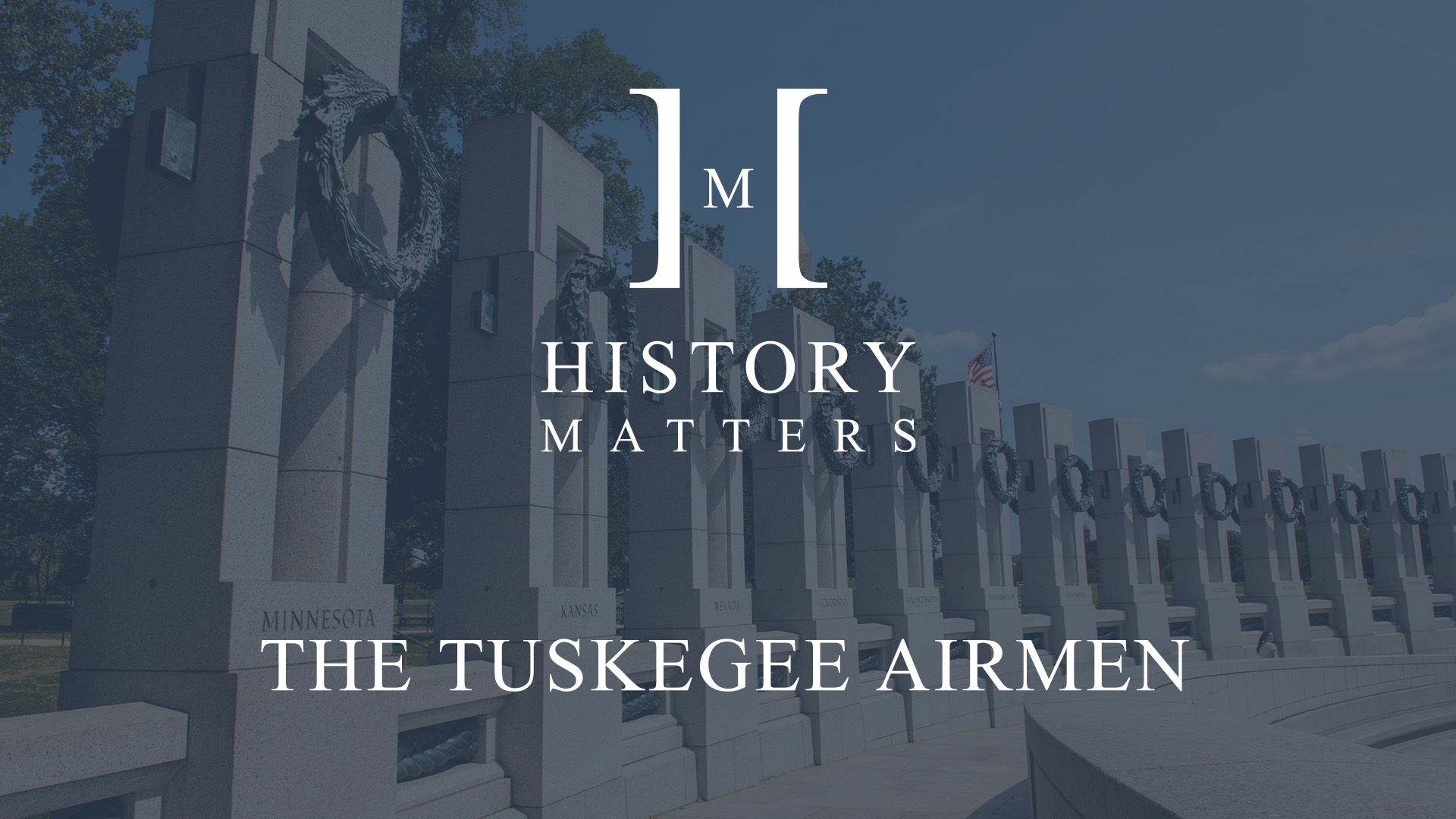IU C&I Studios Page White HM The Tuskegee Airmen logo with dimmed background of war memorial in Washington DC