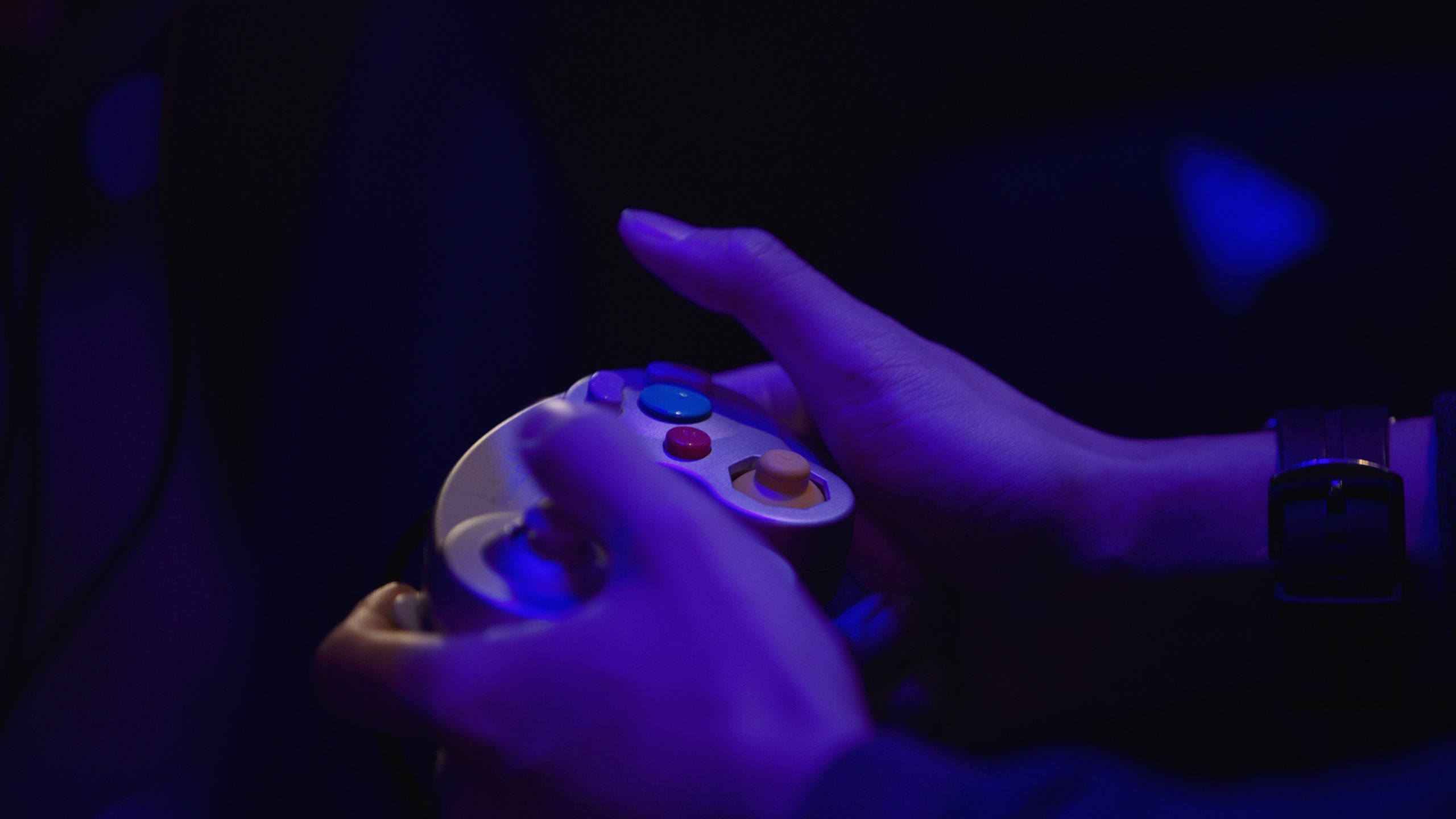 Thunder Gaming eSports Competition Sparkd Studios Closeup of hands holding a video game controller