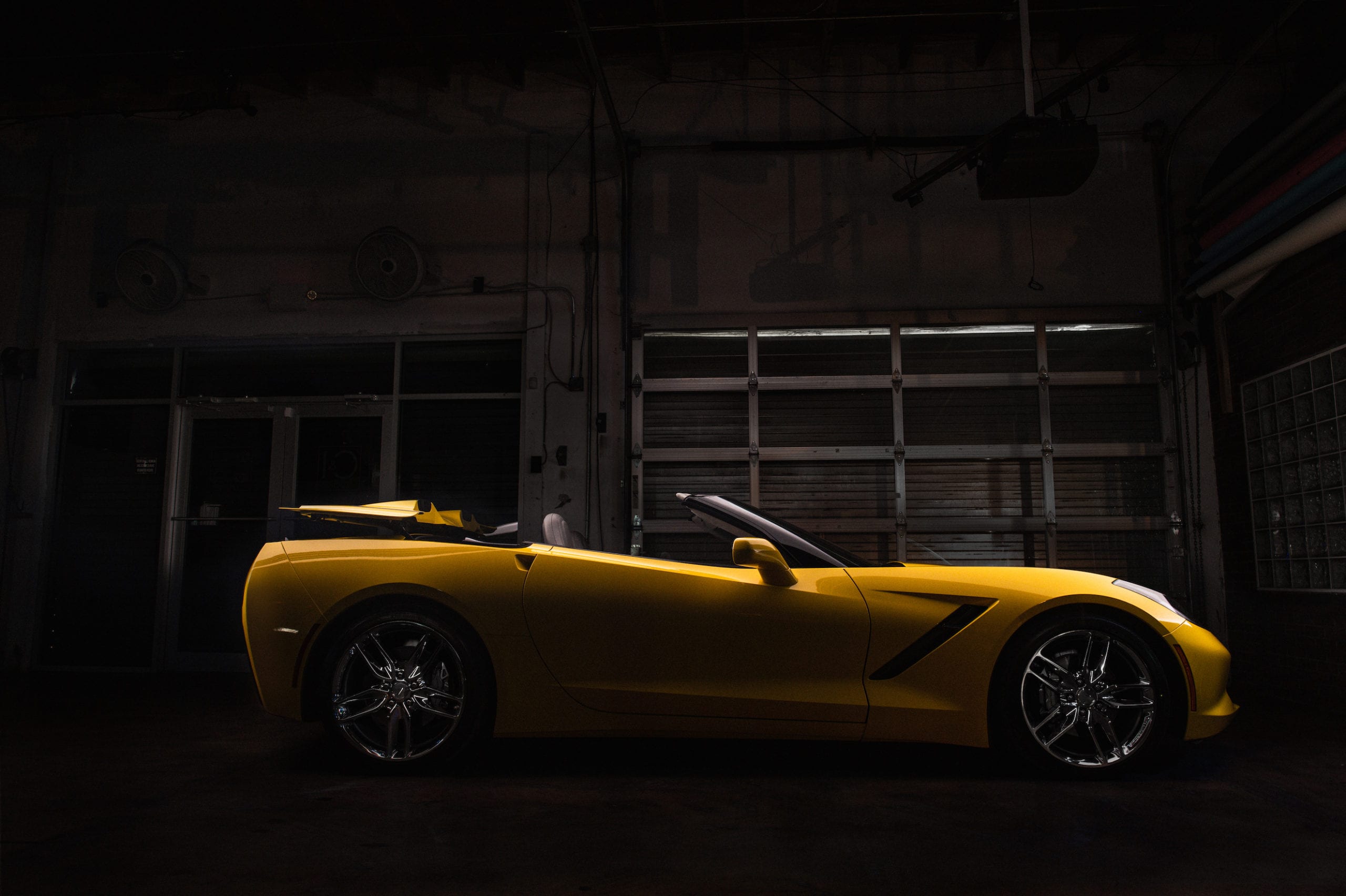 Side profile of a yellow sports car
