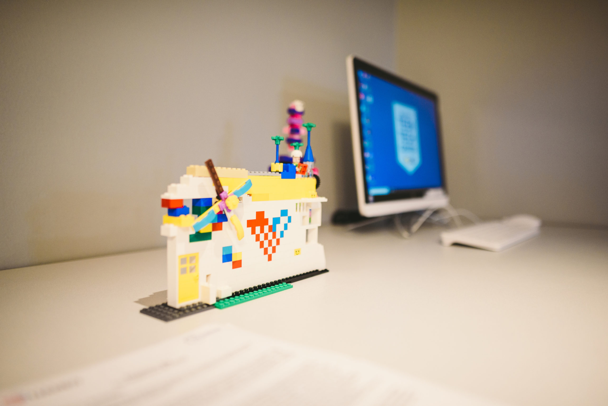 Handy NonProfit Lego structure next to desktop