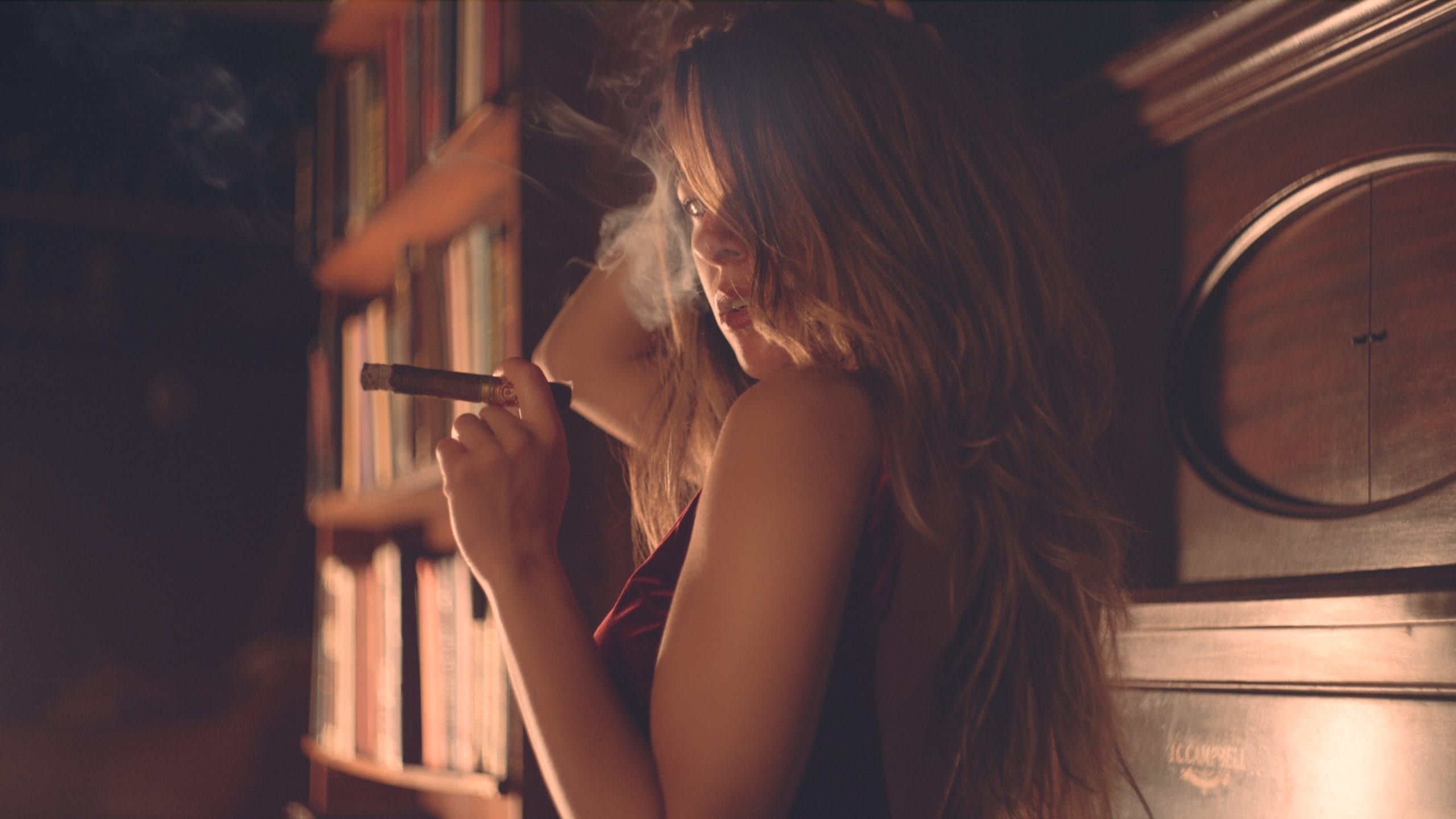 Sabela Model closeup posing for camera holding a cigar