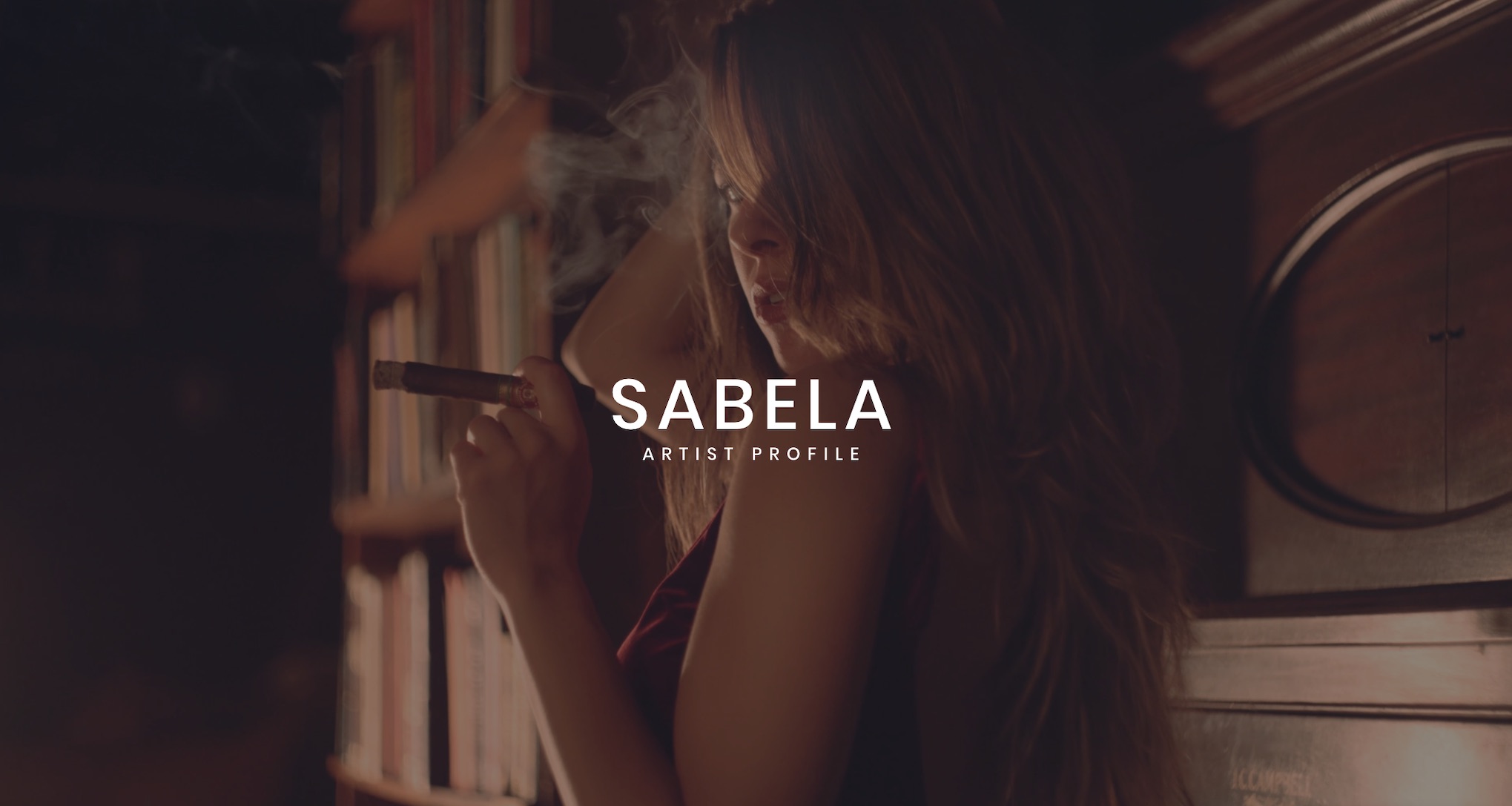 Sabela Artist Management Services White Sabela Artist Profile logo on background of side profile of woman smoking a cigar posing for camera