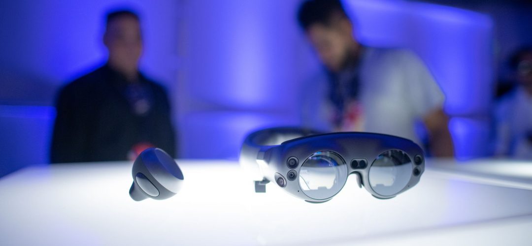 Marketing Magic Leap Lightwear equipment on display with two men in the background