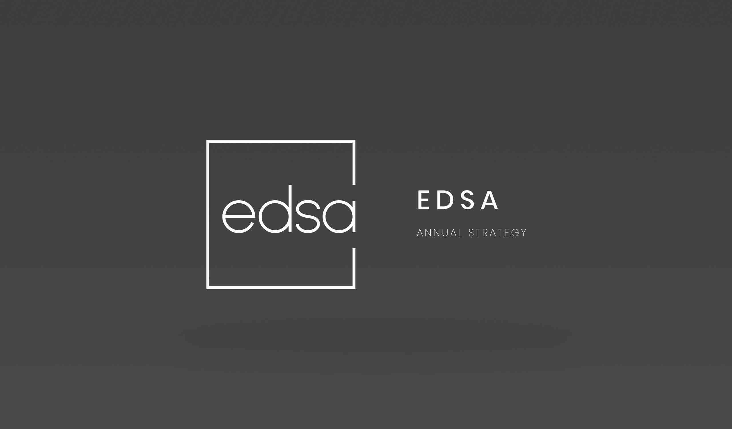 White EDSA Twelve Month Strategy logo on gray background