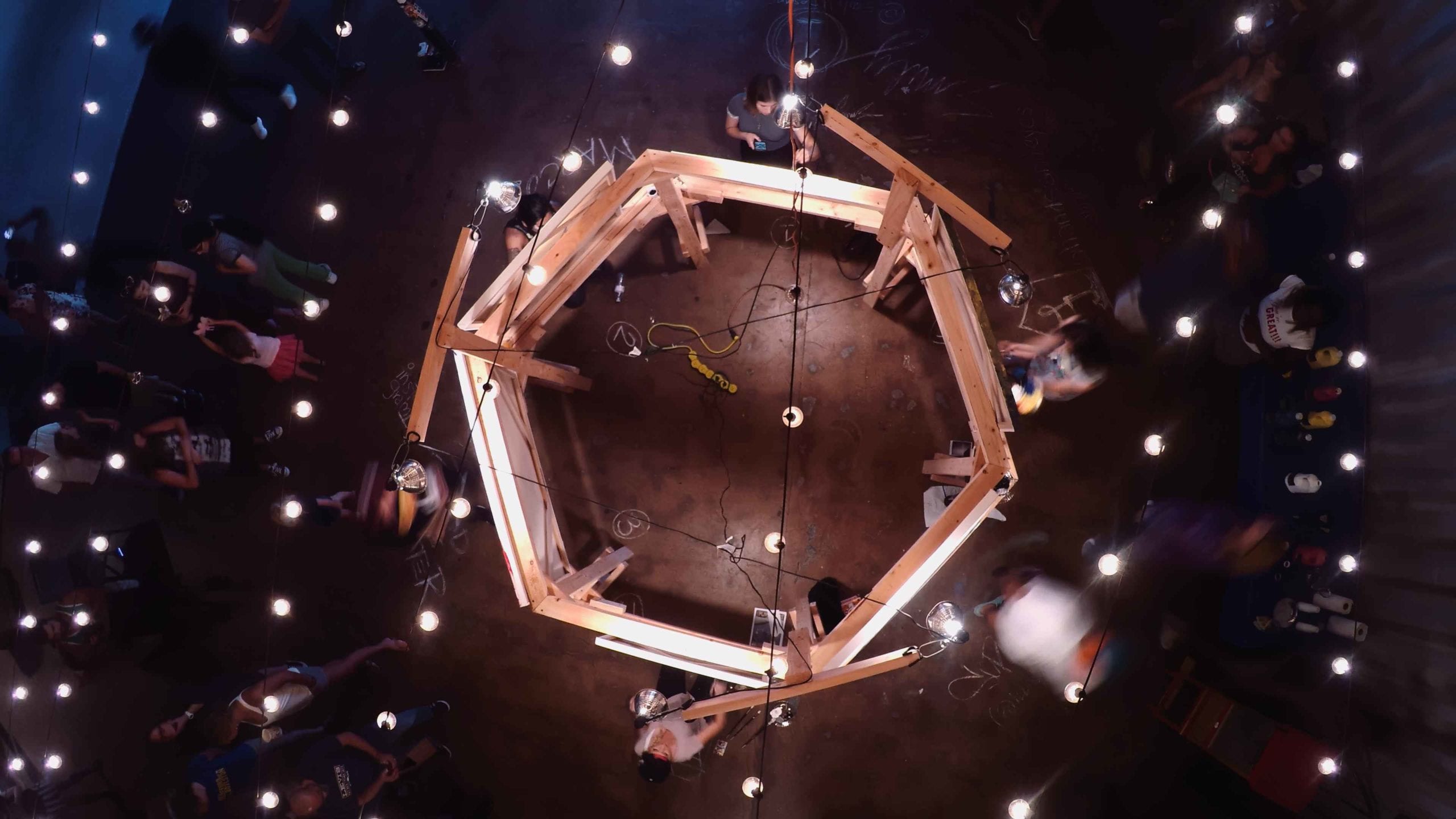 Overhead view of a set with lights and people