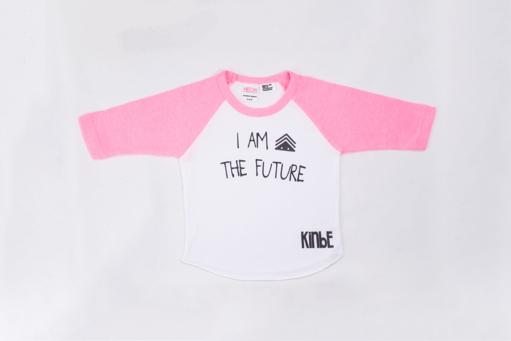 Kinbe Kids Product Pink and white I Am The Future shirt on display with Kinbe logo