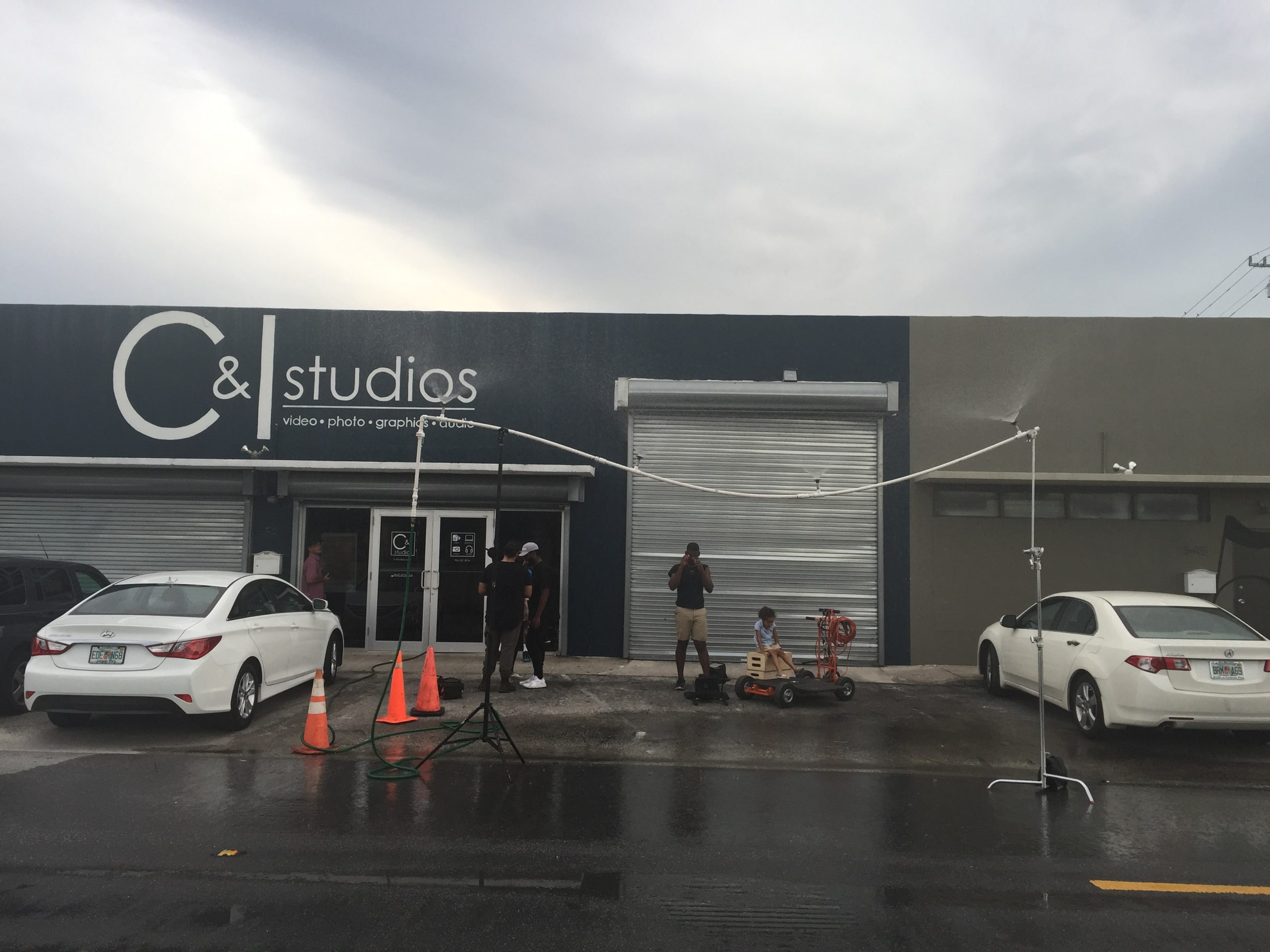 IU C&I Studios Page Company from the outside with cars and equipment