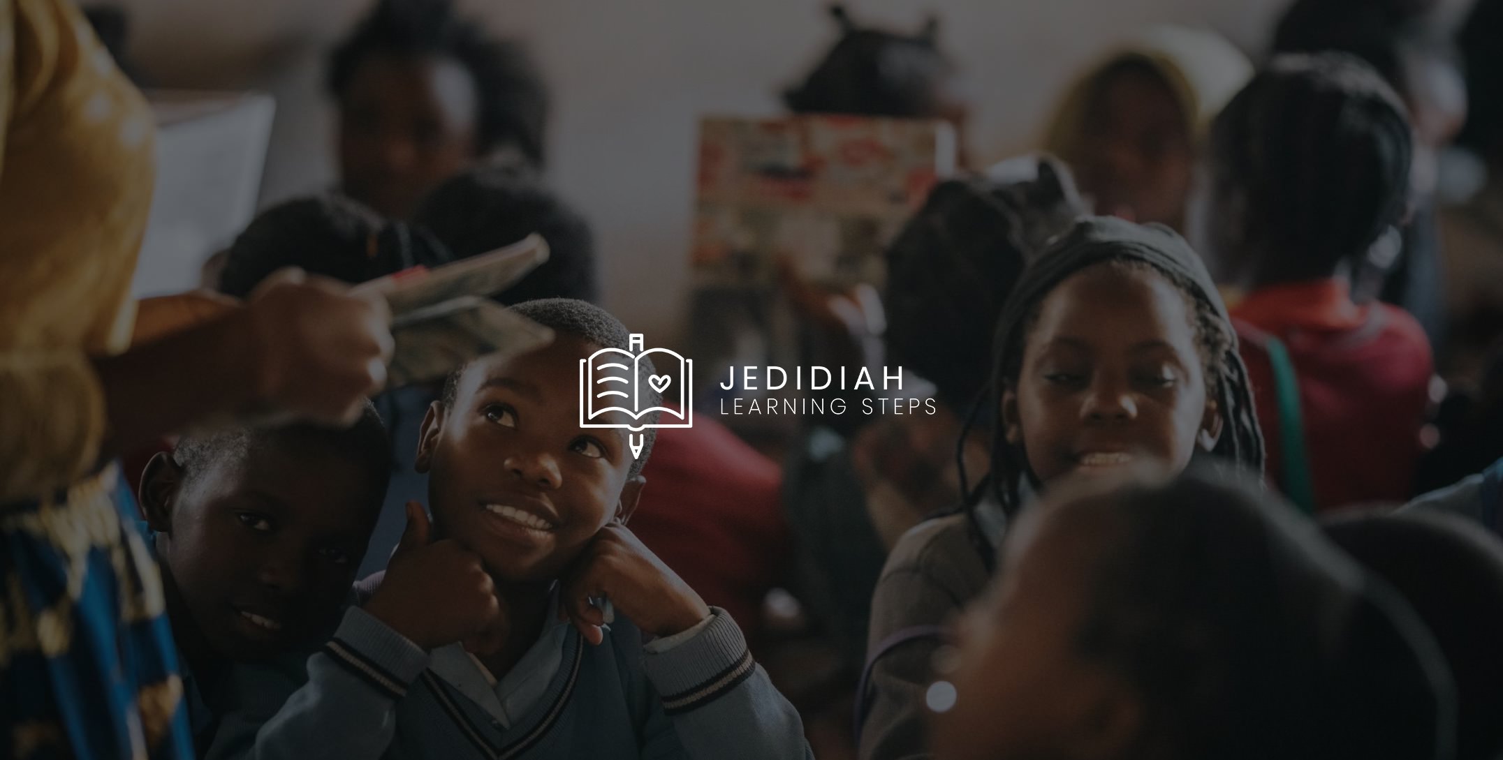 White Jedidiah Learning Steps logo with background of children in a classroom