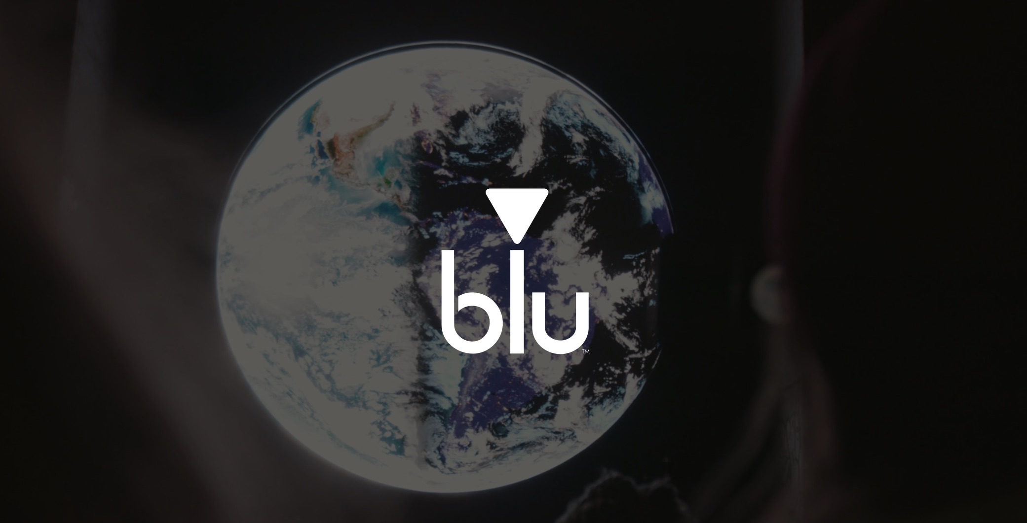 IU C&I Studios Page White Blu logo on background of earth art