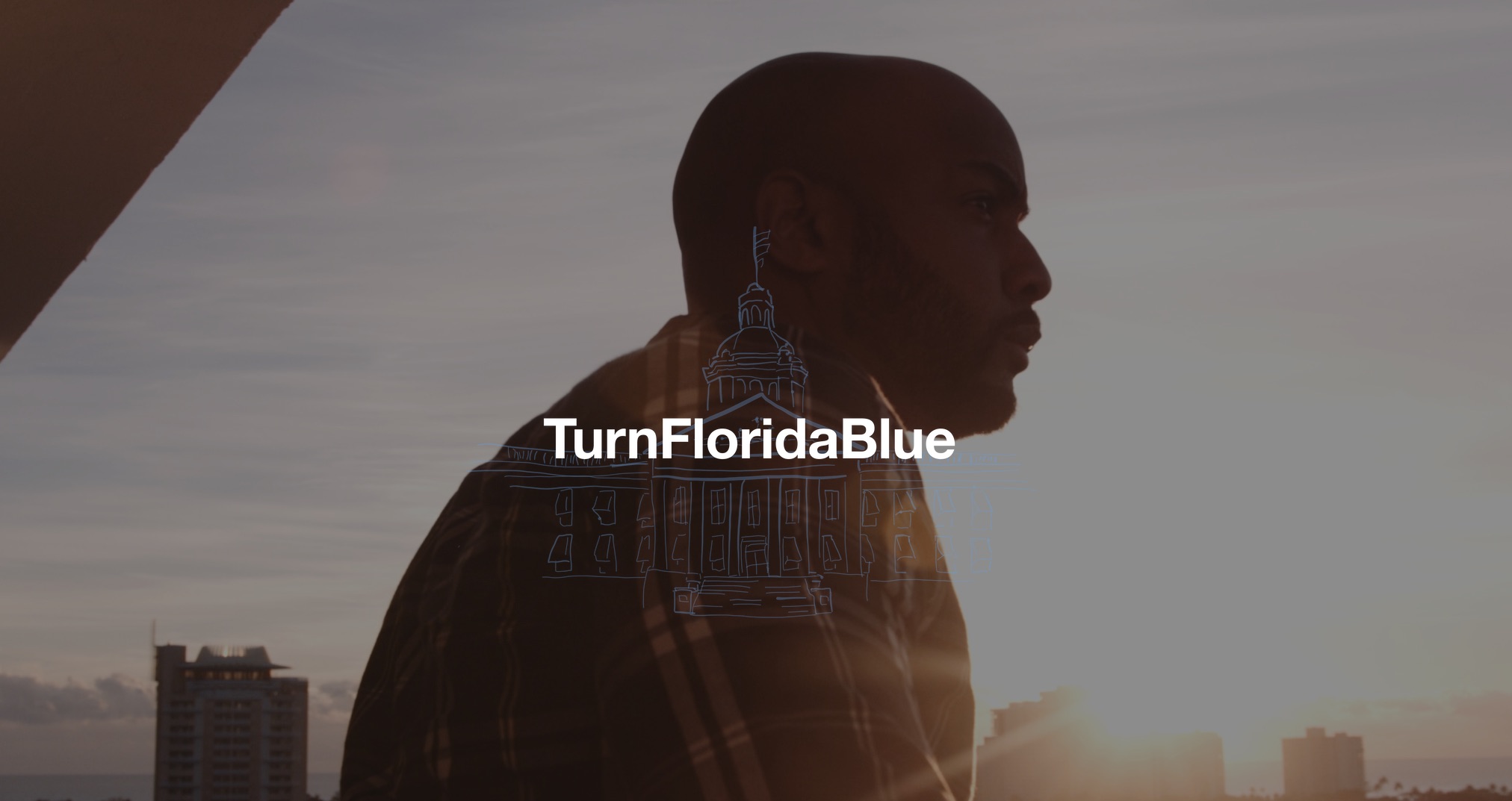 IU C&I Studios Page Florida House Victory Campaign White and blue Turn Florida Blue logo on backdrop of side profile of man wearing flannel shirt with the setting sun behind him