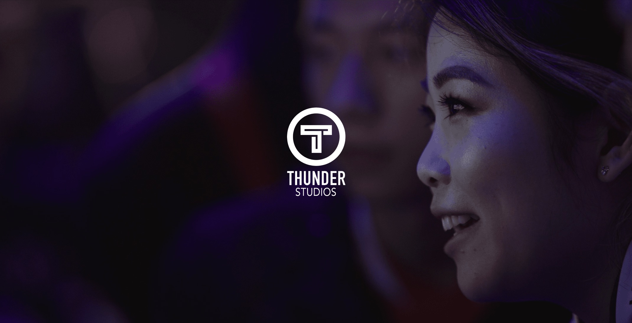 Examples of live streaming work White Thunder Studios logo with background side profile of an Asian woman smiling