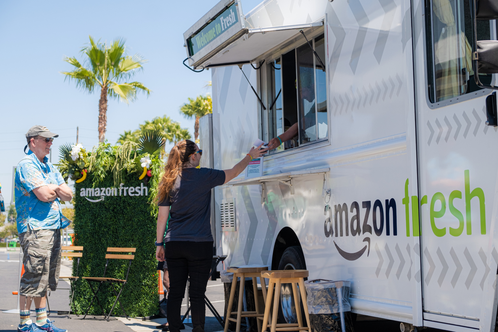 Amazon Fresh Naperville food truck with man and woman standing by it