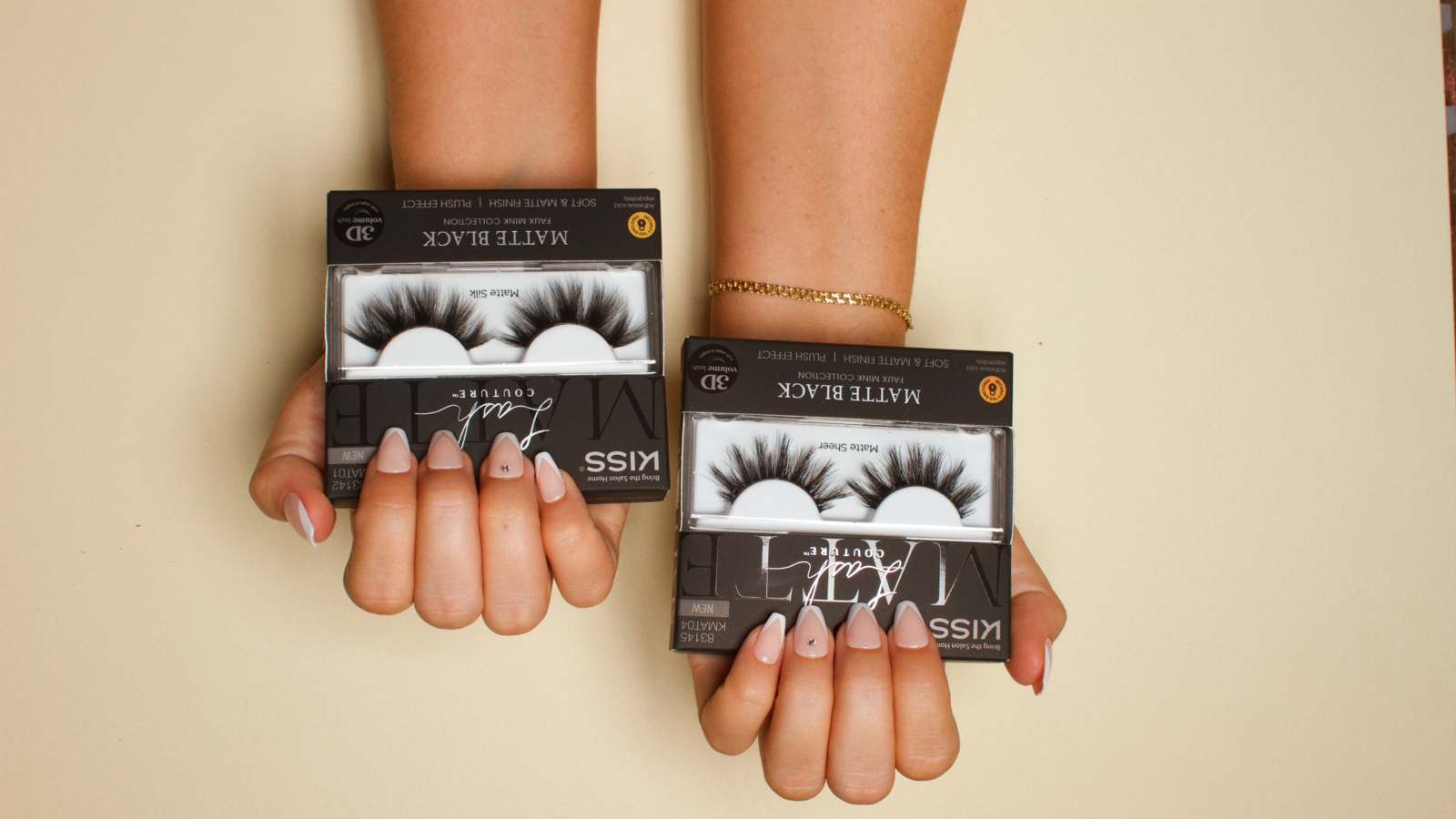 Product Photography Tips for Shopify View from above of woman holding two packages of KISS Lash Couture eye lashes